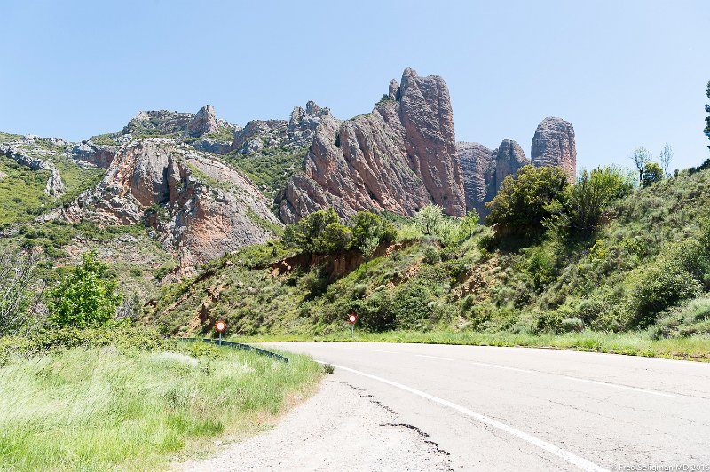 20160601_141301 D4S.jpg - Mallos de Riglos are a set of huge red rock formations that rise up as pillars up to 1000 feet in height.  Its a popular rock climbing place.  Located near Riglos about 25 miles from city of Huesca